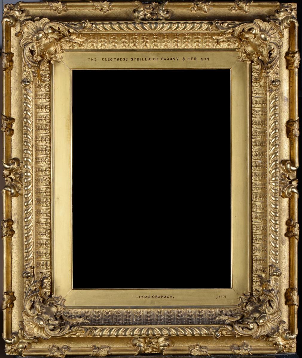 A British 19th-century gilt compo frame; with plain slip, leaf scoop, cartouche corners, gadrooned knull, punched back scoop and oak leaf-and-acorn rail.