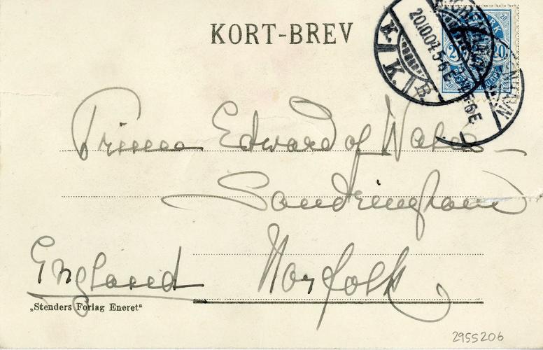 Postcard of a soldier holding an envelope