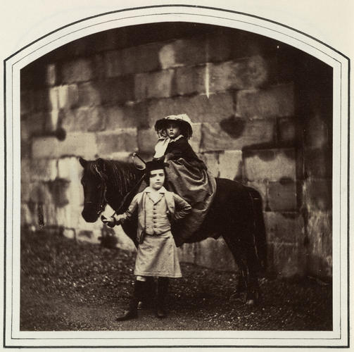[Untitled] A young girl on a pony