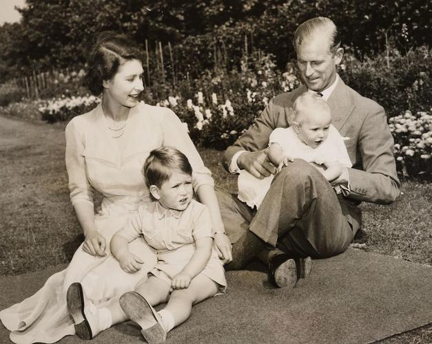The Duke of Edinburgh and Princess Elizabeth with Prince Charles and Princess Anne in the garden at Clarence House