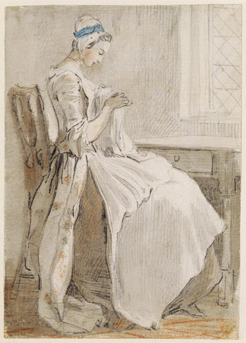 A lady seated by a window