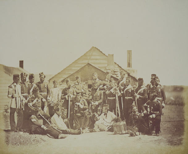 Group outside hut with drum [taken from contents list]. [Crimean War photographs by Robertson]