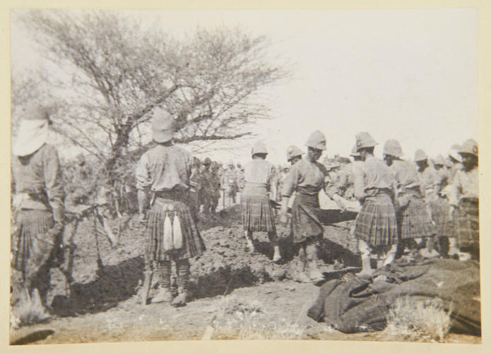 Soldiers burying their dead after the Battle of Atbara