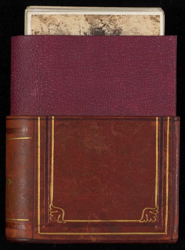 Decorative album shaped box containing cartes-de-visite photographs Decorative album shaped box containing cartes-de-visite photographs