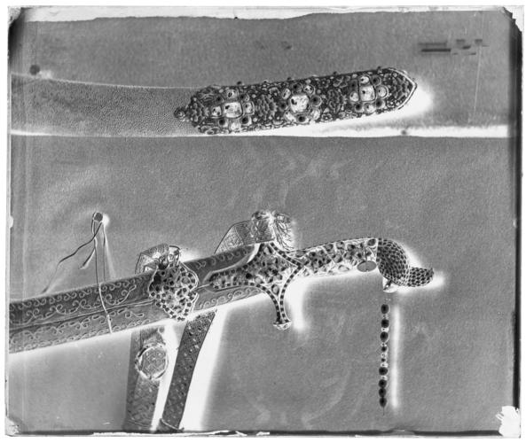 Glass plate negative of sword hilt and scabbard tip Glass plate negative of sword hilt and scabbard tip