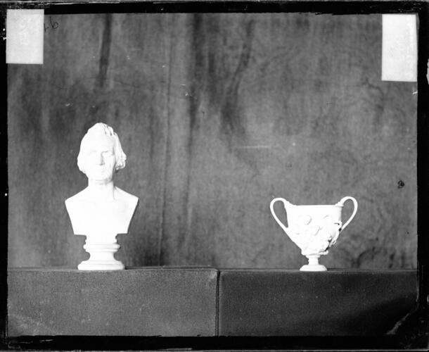 Glass plate negative of a bust and a vase Glass plate negative of a bust and a vase