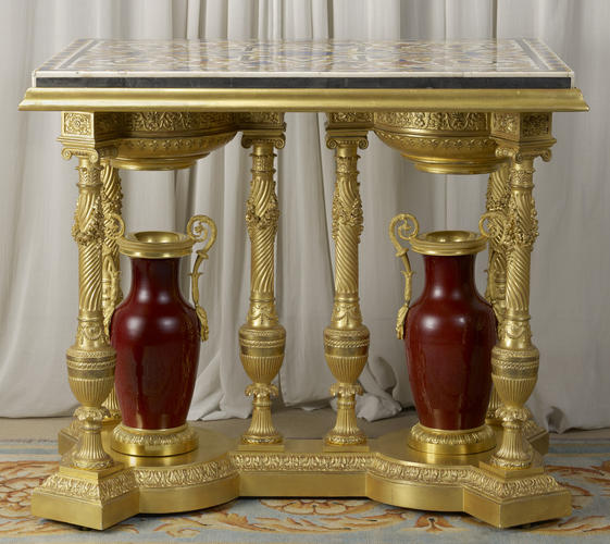 Table with pair of mounted vases