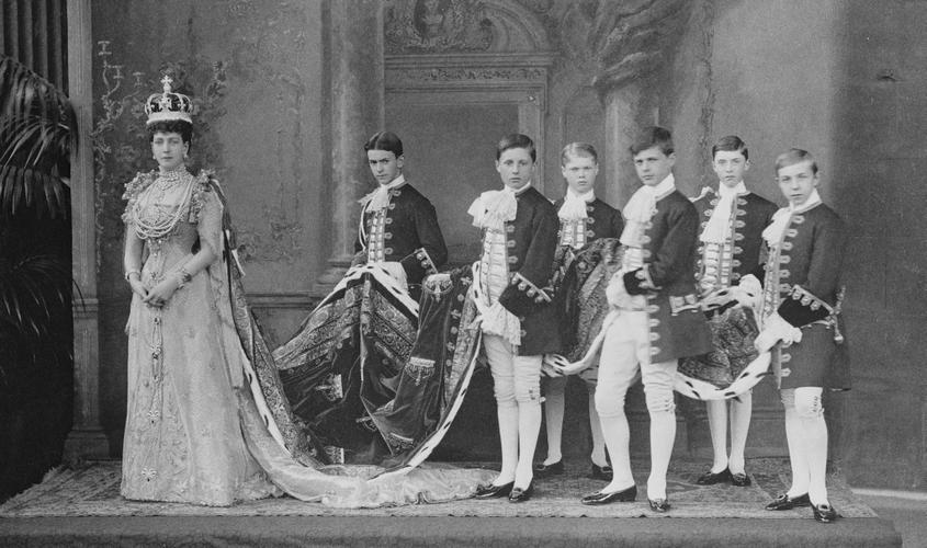Queen Alexandra (1843-1925) wearing Coronation robes, with attendants, 1902