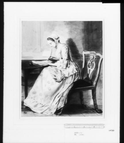 A lady writing a letter