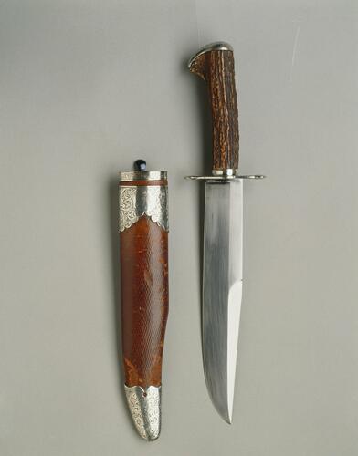 Hunting knife and scabbard Hunting knife and scabbard
