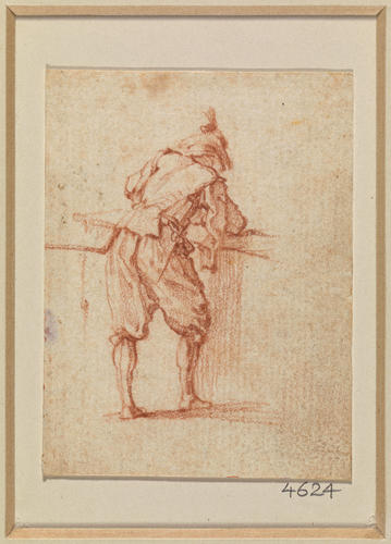 A man leaning on a parapet A man leaning on a parapet