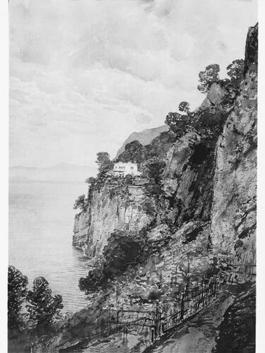 White house on a cliff, overlooking the sea