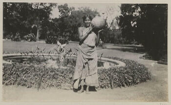 Woman holding an urn, Madras: Edward, Prince of Wales. Royal Tour of India, 1921-1922 Woman holding an urn, Madras: Edward, Prince of Wales. Royal Tour of India, 1921-1922