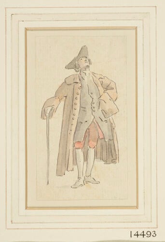 A man standing, looking upwards