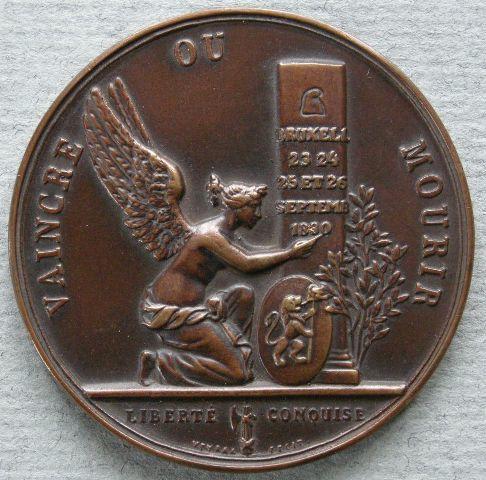 Belgium. Medal commemorating the visit of King George and Queen Mary to the Historical Exhibition at Brussels Belgium. Medal commemorating the visit of King George and Queen Mary to the Historical Exhibition at Brussels