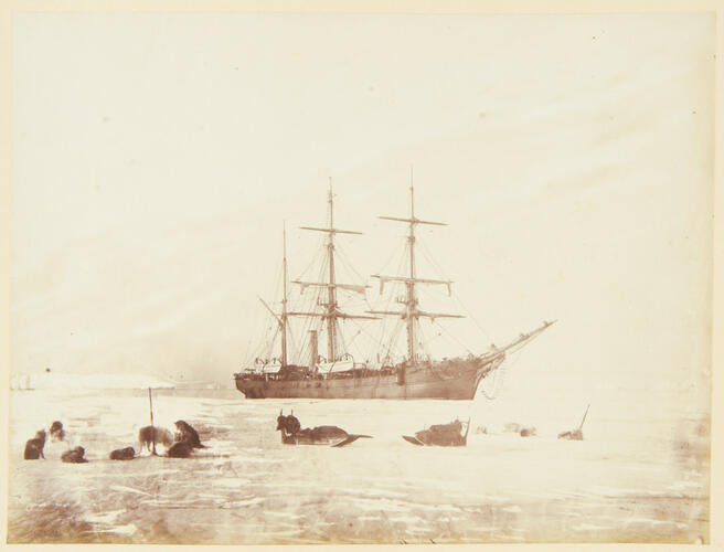 HMS Discovery, Cape York - Indigenous peoples sledges on ice in foreground HMS Discovery, Cape York - Indigenous peoples sledges on ice in foreground