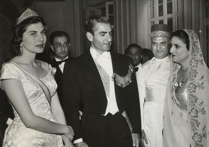 The Shah of Iran, Muhammad Reza Shah Pahlavi (1919-80) and his wife Princess Soraya Esfandiary-Bakhtiary (1932-2001) with Bapsy Cursetji Pavry, Marchioness of Winchester (1902-95) and her brother Jal Datsur Cursetji Pavry (1889-1985)