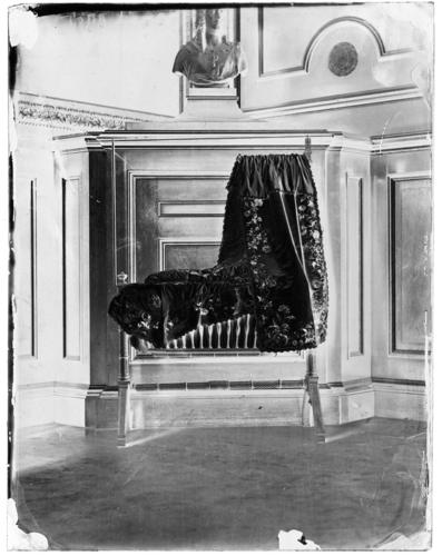 Glass plate negative of a baby's cradle Glass plate negative of a baby's cradle