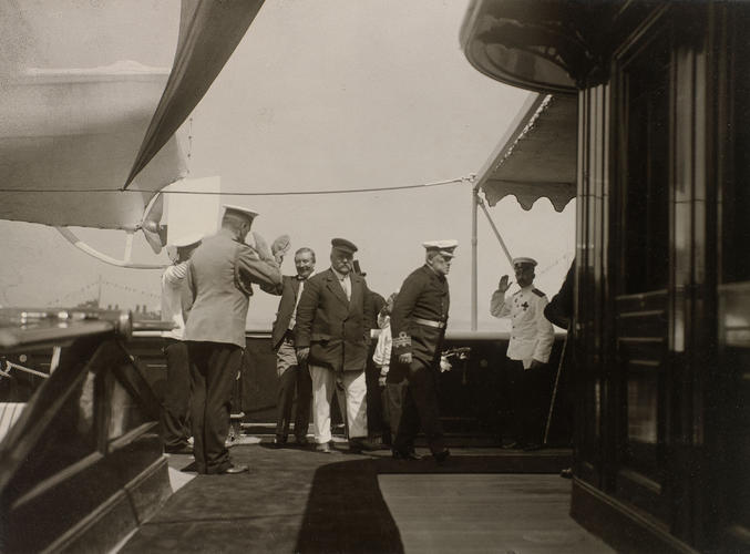 A group of men on the deck of the Russian Imperial Yacht Standart during the Cowes Regatta, 1909 A group of men on the deck of the Russian Imperial Yacht Standart during the Cowes Regatta, 1909