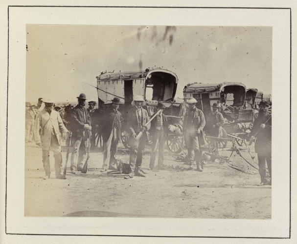 Some men of Prince Alfred's party while encamped by a river in South Africa