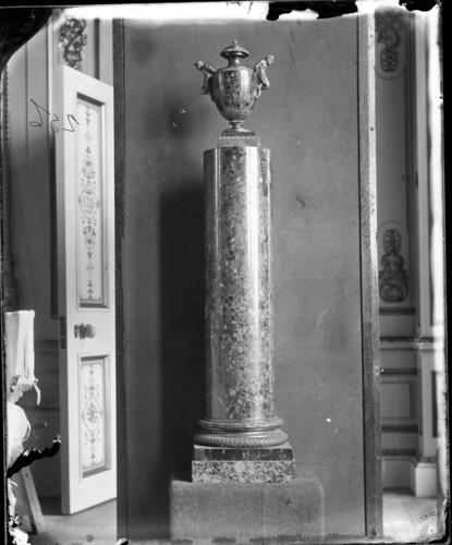 Glass plate negative of malachite vase on a column plinth