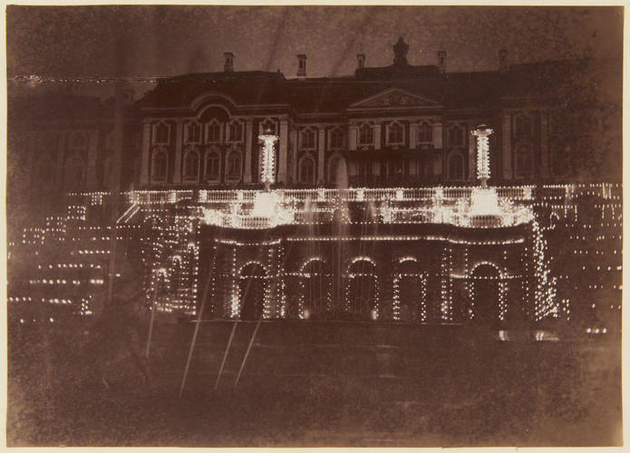 The Grand Palace, at night, with illuminated fountains. [Peterhof, 1893. ]