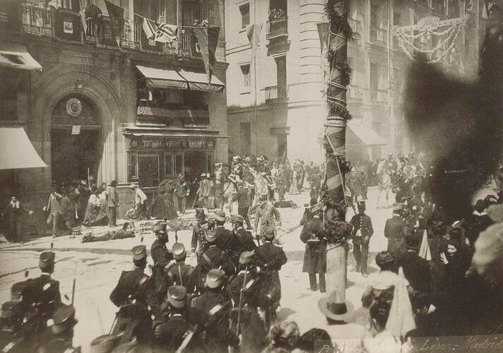 Photograph taken during the wedding procession of King Alfonso XIII and Queen Victoria Eugenia of Spain, Madrid, 31 May 1906 Photograph taken during the wedding procession of King Alfonso XIII and Queen Victoria Eugenia of Spain, Madrid, 31 May 1906