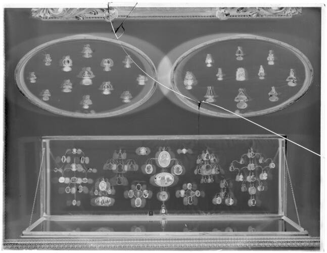 Glass plate negative of displays of rings and seals Glass plate negative of displays of rings and seals