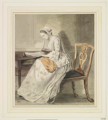 A lady writing a letter