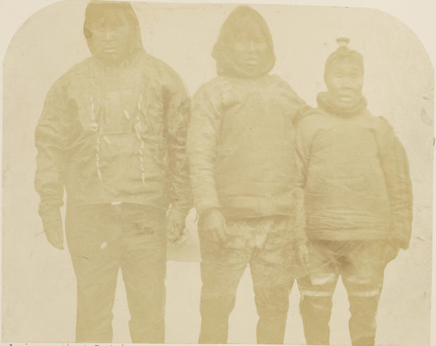 Inuit man with man and wife