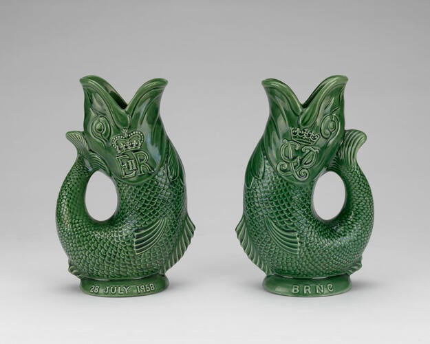 Master: A pair of fish gurgle jugs