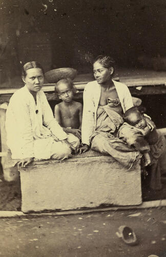 Portrait of two women and two children Portrait of two women and two children