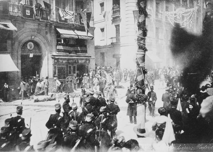 Photograph taken during the wedding procession of King Alfonso XIII and Queen Victoria Eugenia of Spain, Madrid, 31 May 1906
