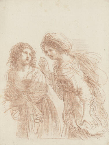 Two women in long, flowing dresses Two women in long, flowing dresses