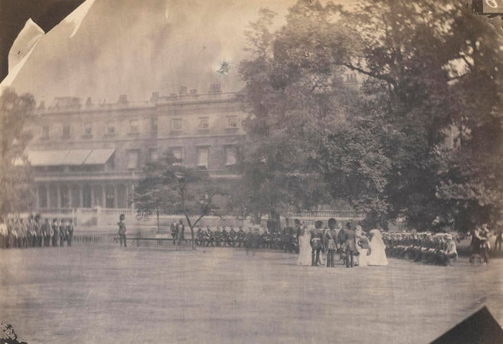 Queen Victoria meeting wounded Crimean War veterans in the gardens of Buckingham Palace