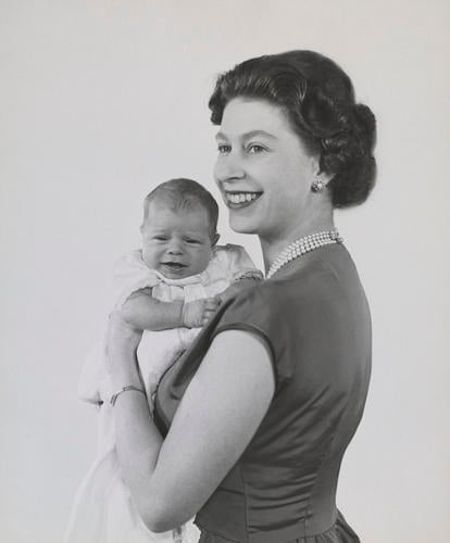 Queen Elizabeth II holding an infant Prince Andrew Queen Elizabeth II holding an infant Prince Andrew