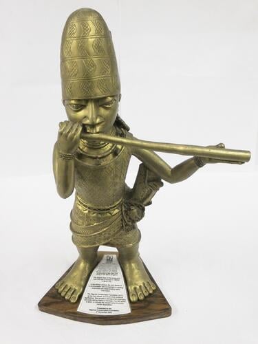 Figure of a hornblower