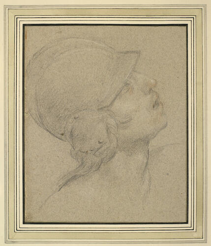 The head of a helmeted man