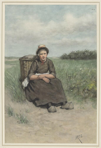 Dutch fishergirl seated in sand dunes