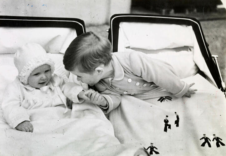 Prince Charles with Princess Anne in Clarence House Garden, 1951