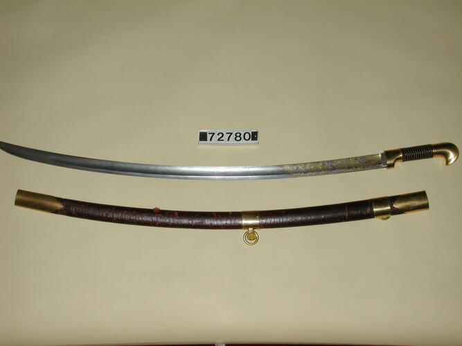Sabre and scabbard Sabre and scabbard