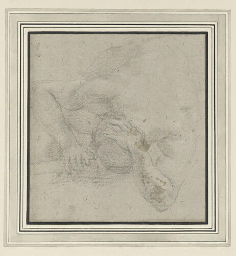 The back of a crouching nude man