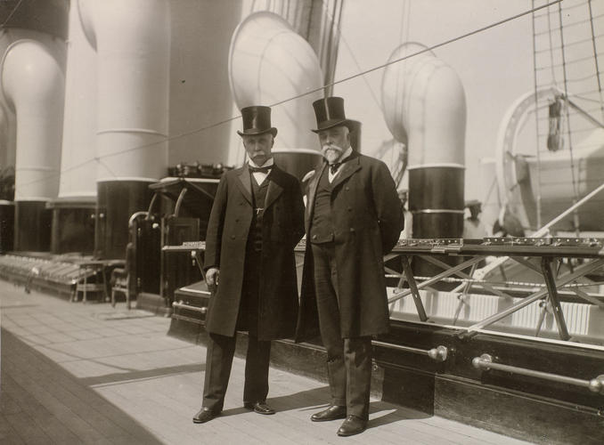 Two men standing on the deck of the Russian Imperial Yacht Standart during the Cowes Regatta, 1909 Two men standing on the deck of the Russian Imperial Yacht Standart during the Cowes Regatta, 1909