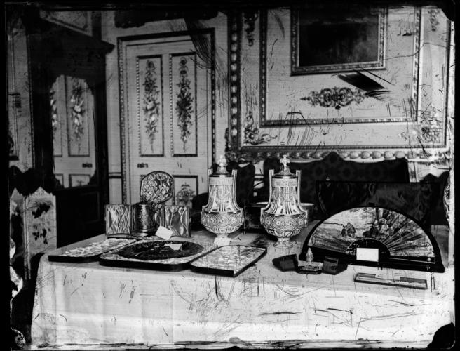 A glass plate negative of a display of objects in the White Drawing Room, Windsor Castle A glass plate negative of a display of objects in the White Drawing Room, Windsor Castle