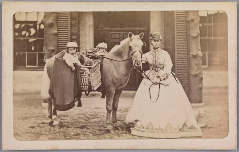 Queen Alexandra when Princess of Wales with two children in horse-baskets