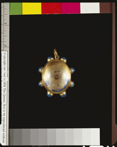 Gilt metal locket with photograph of Princess Victoria Mary of Teck (1867-1953)