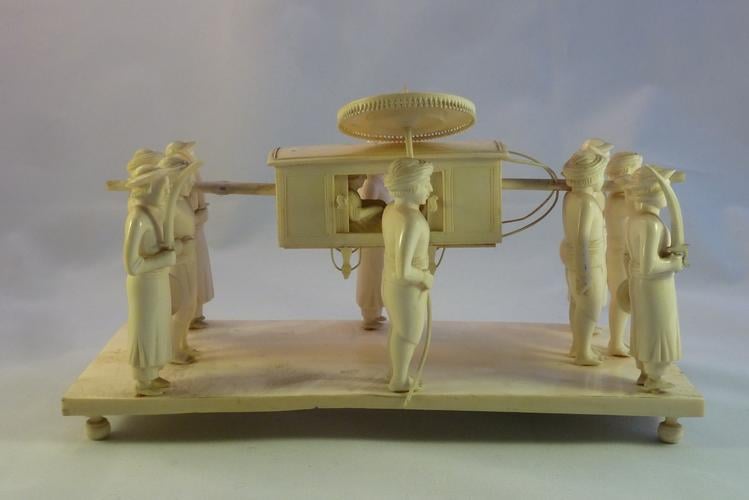 Model of palanquin and bearers Model of palanquin and bearers