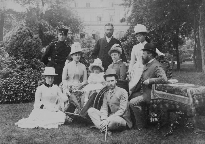 Group photograph showing Hereditary Grand Duke of Hesse; Prince Louis of Battenburg; Grand Duchess Elizabeth of Russia; Princess Louis of Battenburg et al, Dormstadt[?] 1887. [Album: Photographic Port