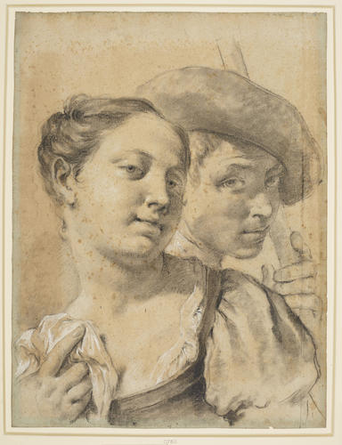 Heads of a shepherd and a girl
