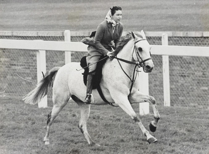 HM Queen Elizabeth II (b. 1926) rides the Ascot racecourse